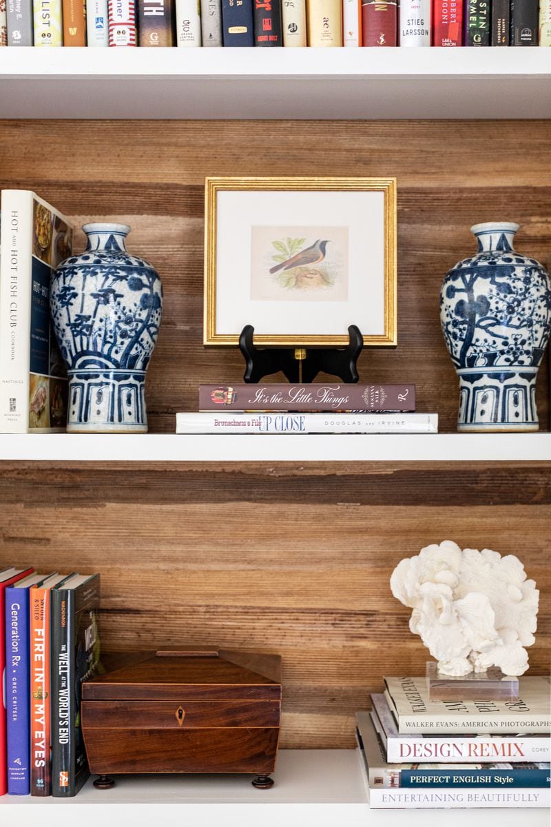 Don't fill shelves with matchy-matchy decorative objects with no real purpose, says designer Bailey Ward. Instead use books, souvenirs picked up during travels, artwork and other meaningful personal items to create coziness in your home.
(Courtesy of Bailey Ward Interiors / Heidi Harris Photography)