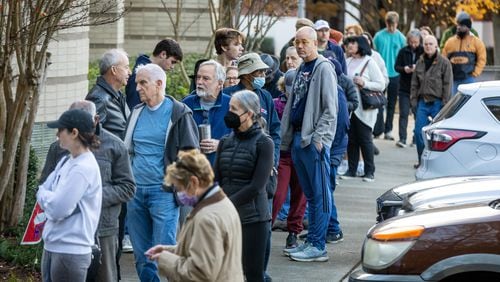 People wait in line to vote outside Atlanta’s Joan P. Garner Library at Ponce de Leon during the first day of advance in-person voting in Fulton County on Saturday, Nov.  26, 2022, for the runoff election. (Photo: Steve Schaefer/steve.schaefer@ajc.com)