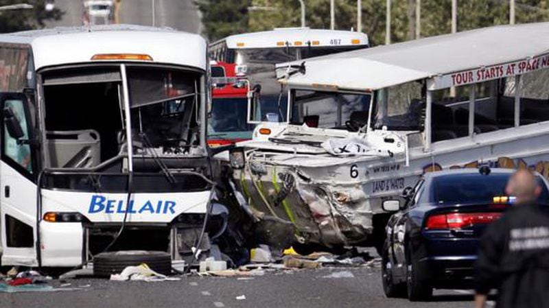 A charter bus, left, and an amphibious Ride the Ducks tour vehicle collided on the Aurora Bridge in downtown Seattle on Thursday, Sept. 24, 2015.