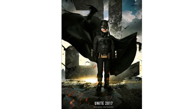 Simon Fullmer is dressed as Batman for a "Justice League"-themed photo shoot.