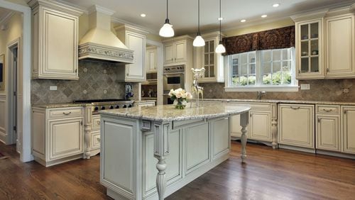 Furniture-style islands can add both character and functionality to your kitchen. (Dreamstime)