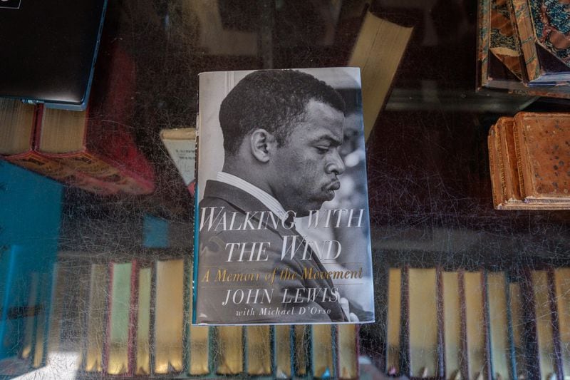 A signed copy of John Lewis’ memoir is seen in A Capella Books in Atlanta on Friday, Aug. 5, 2022. (Arvin Temkar / arvin.temkar@ajc.com)