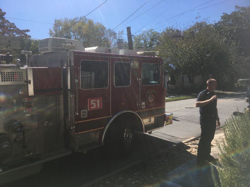  The fire was out but the air was still a little smoky when Engine 51 arrived. Luckily I was home and a fast-acting preacher from Alabama was driving down the road when the front yard caught fire. Photo: Jennifer Brett