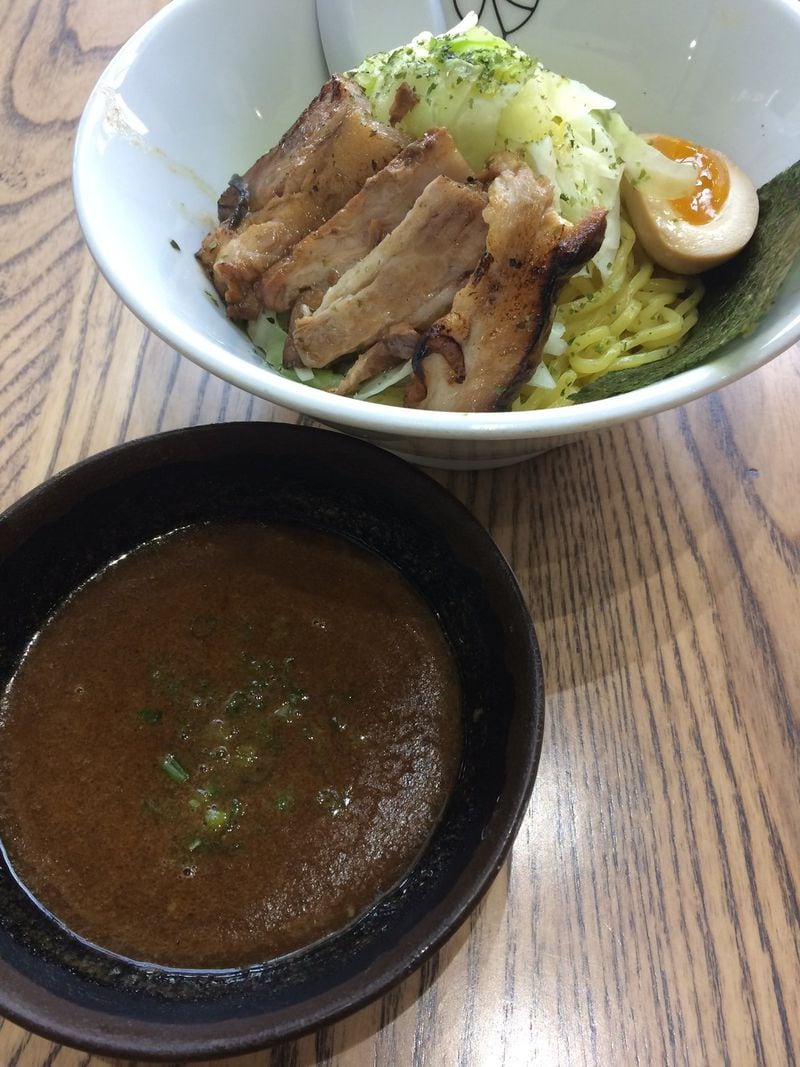 To truly appreciate the tsukemen (dipping ramen) at Momonoki, it’s best to use your chopsticks to move the noodles from bowl to bowl, rather than dumping the broth on the dish. CONTRIBUTED BY WENDELL BROCK