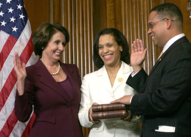 House Speaker Nancy Pelosi (D-Calif.) administers the House oath to Rep. Keith Ellison (D-Minn.) on Capitol Hill in 2007. Ellison's wife Kim holds Thomas Jefferson's Quran which was provided by the Library of Congress. (Lawrence Jackson / AP file)