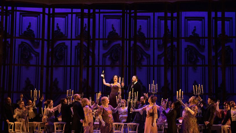 Zuzana Marková performs as Violetta and Mario Chang performs as Alfredo with members of the Atlanta Opera Chorus in the Atlanta Opera’s new production of “La Traviata” at the Cobb Energy Performing Arts Centre. Contributed by Nunnally Rawson