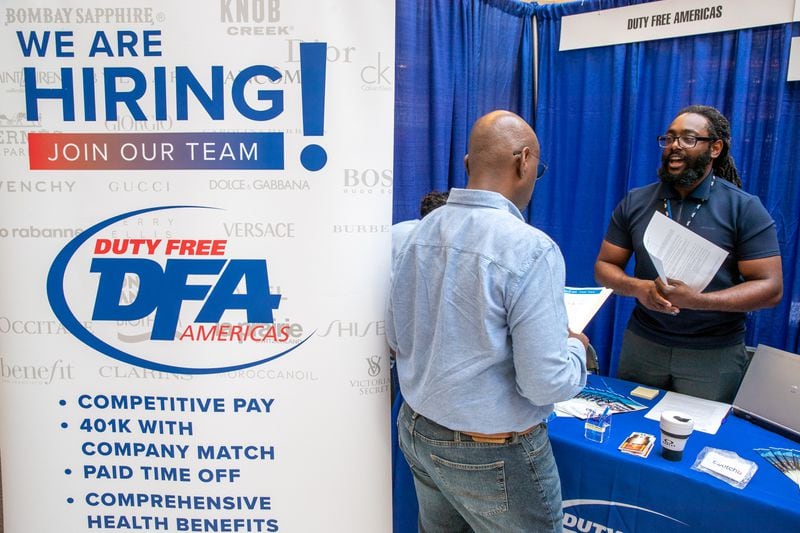 Jelani Walls (R) with Duty Free Americas talks with a potential new employee During the ATL Airport Career Fair at the domestic terminal atrium Monday, June 14, 2020.  (Steve Schaefer / steve.schaefer@ajc.com)