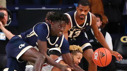 Georgia Tech defender Abdoulaye Gueye knocks the ball away from Boston College guard Ky Bowman as he knocks him to the hardwood Sunday, March 3, 2019, at McCamish Pavilion in Atlanta.