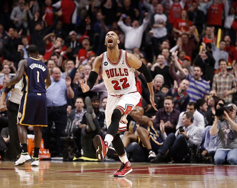 Chicago Bulls forward Taj Gibson (22) celebrates after his dunk off a rebound during the second half of an NBA basketball game against the Indiana Pacers Monday, March 24, 2014, in Chicago. The Bulls won 89-77. (AP Photo/Charles Rex Arbogast) The Bulls enjoyed beating Indy on Monday. (Charles Rex Arbogast/AP)