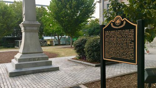 The new “contextual marker” next to the controversial 1908 Confederate memorial on Decatur’s square. Bill Banks for the AJC