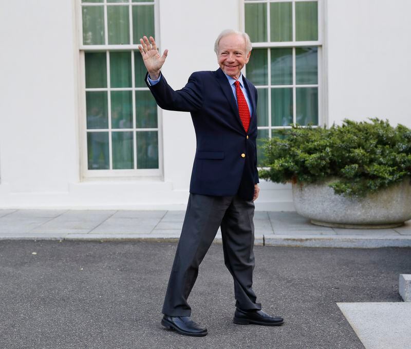 FILE - Former Connecticut Sen. Joe Lieberman waves to members of the media as he leaves the West Wing of the White House in Washington, May 17, 2017. A funeral for Lieberman will be held Friday, March 29, 2024, in his hometown of Stamford, Conn. Lieberman died in New York City on Wednesday, March 27, at age 82. (AP Photo/Pablo Martinez Monsivais, File)
