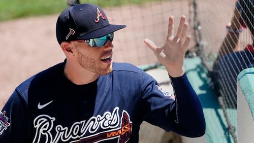 Atlanta Braves first baseman Freddie Freeman (5) waves to fans as he exits the final spring training game Tuesday, March 30, 2021, against the Boston Red Sox in Fort Myers, Fla. (John Bazemore/AP)