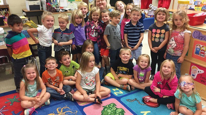 Letitia Cline of Cherokee Schools’ Office of Curriculum & Instruction celebrates Georgia PreK Week as a guest reader in teacher Whitney Hazlewood’s Georgia PreK class at R.M. Moore Elementary School in October 2017. Open preschool enrollment for the 2018-19 school year will run through May 11. CHEROKEE COUNTY SCHOOL DISTRICT