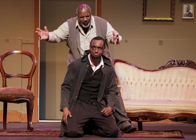 Jermal Collins (kneeling) and Keith Franklin perform a scene from “Joe Turner’s Come and Gone” by August Wilson at the New African Grove Theater. 
Courtesy of the New African Grove Theater.