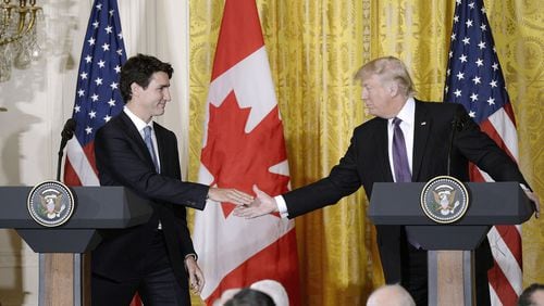 President Donald Trump and Canadian Prime Minister Justin Trudeau at a joint news conference in February. (Olivier Douliery/Abaca Press/TNS)