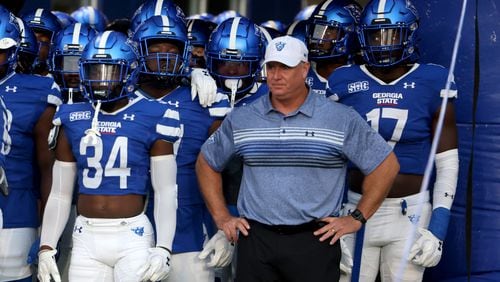 Georgia State Panthers head coach Shawn Elliott waits with players including safety Antavious Lane (34) and linebacker Shamar McCollum (17) before they run onto the field for their game against Coastal Carolina at Center Parc Stadium, Thursday, September 22, 2022, in Atlanta. (Jason Getz / Jason.Getz@ajc.com)