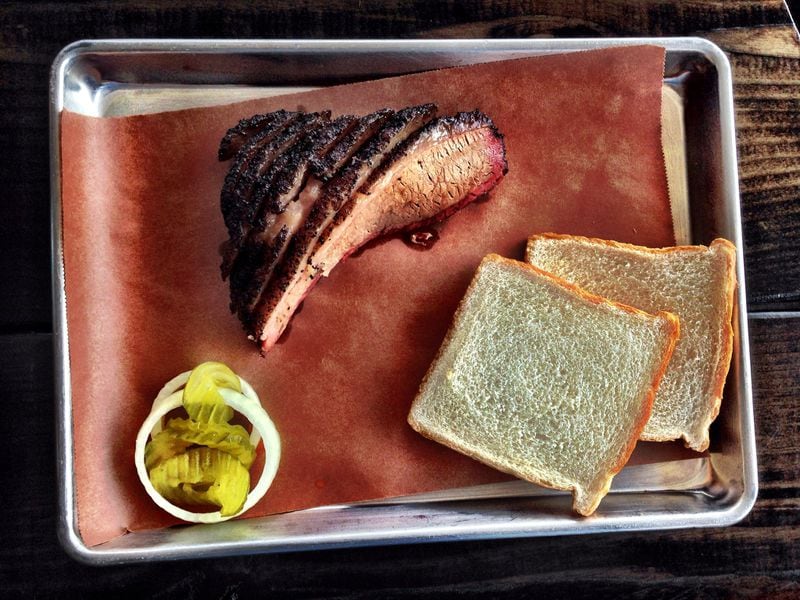 All of the meat plates at DAS BBQ are accompanied by pickles, onions and white bread. CONTRIBUTED BY WYATT WILLIAMS
