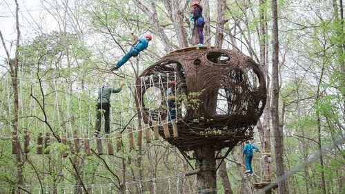 One of the most striking elements of Navitat Knoxville’s Canopy Experience at Ijams Nature Center is a “bird’s nest” installation created by local artist Kelly Brown. There are a number of environmental artworks incorporated into the adventure park. CONTRIBUTED BY CORINNE KROGH / NAVITAT KNOXVILLE