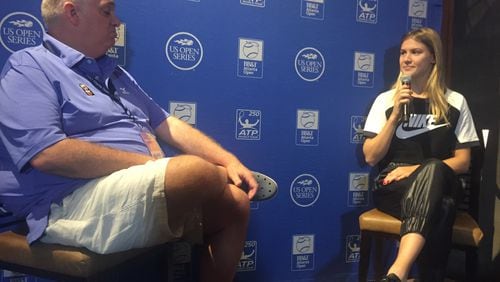 Genie Bouchard, Canada’s No. 1 ranked player, speaks with the media and Rick Limpert, media and communications manager of the BB&T Atlanta Open, before her exhibition match Sunday. She opposed Venus Williams at Atlantic Station.