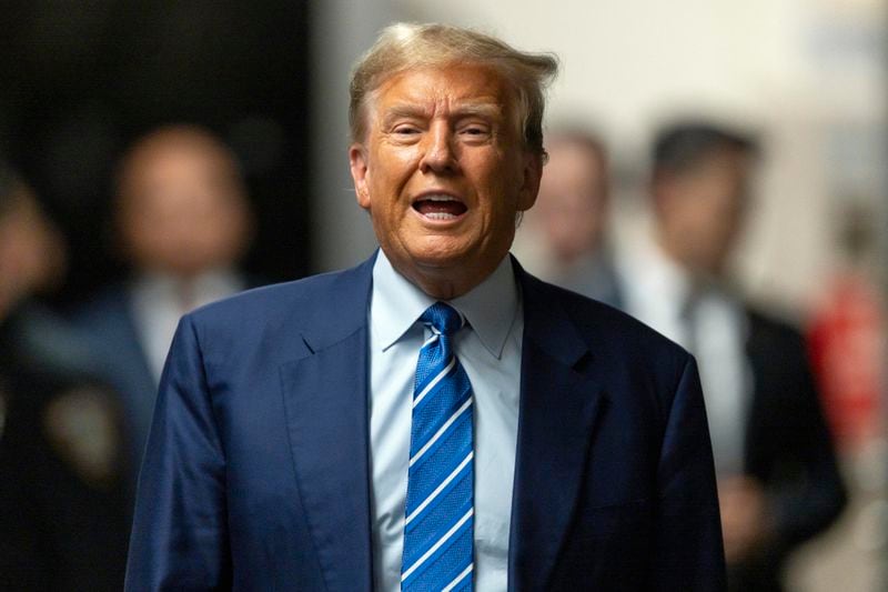 Former President Donald Trump addresses the media following the second day of jury selection, Tuesday, April 16, 2024, at Manhattan criminal court in New York. Trump is charged with falsifying business records to cover up a sex scandal during his 2016 campaign. (Justin Lane/Pool Photo via AP)