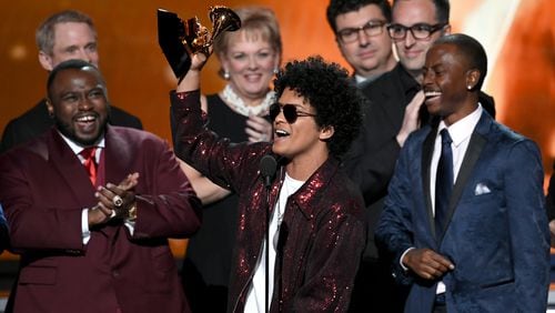 Bruno Mars (C) accepts Album of the Year for '24K Magic' with production team onstage during the 60th Annual GRAMMY Awards at Madison Square Garden on January 28, 2018 in New York City. (Photo by Kevin Winter/Getty Images for NARAS)