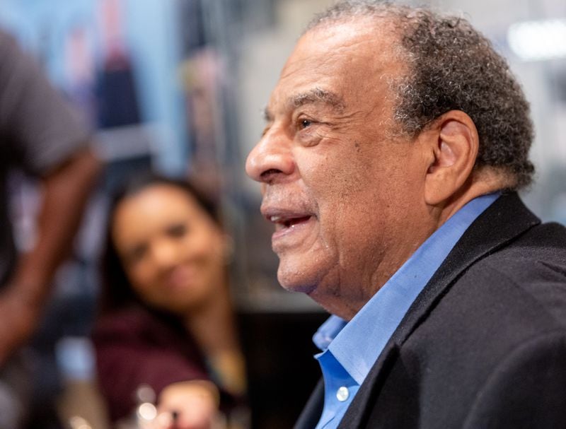 Andrew Young entertains a group of reporters during a press event for the release of the book and opening of the 90-day-exhibit "The Many Lives of Andrew Young" at the Millennium Gate in Atlantic Station on Friday, March 11, 2022, in conjunction with the Ambassador’s 90th birthday.  Later, Young cut the ribbon on the exhibit at a gala at the Gate.  The exhibit will be on display for 90 days.   (Jenni Girtman for The Atlanta Journal-Constitution)