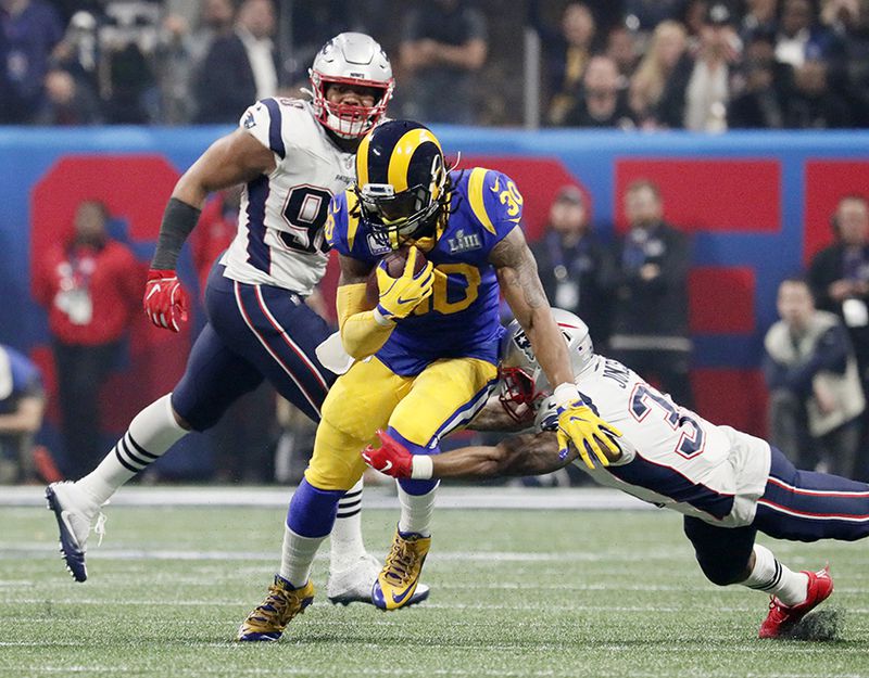 Los Angeles Rams running back Todd Gurley (30) carries the ball during the fourth quarter against the New England Patriots Sunday, Feb. 3, 2019, during Super Bowl LIII at Mercedes-Benz Stadium in Atlanta.