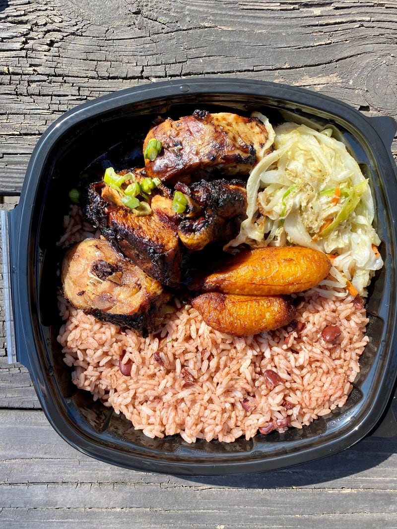 Spicy Hill, a new Jamaican restaurant in Jonesboro, makes seriously good jerk chicken, served with buttery fried plantains, rice and peas and sautéed cabbage. Wendell Brock for The Atlanta Journal-Constitution