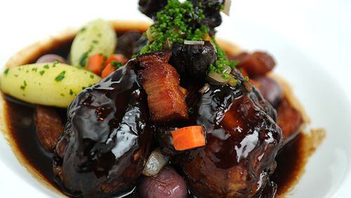 Coq au vin contains red wine. Alcohol does partially evaporate during cooking, but not as much as you might think. Depending on the cooking method and how much alcohol is used, anywhere from 4 to 85% of the alcohol may remain. AJC File