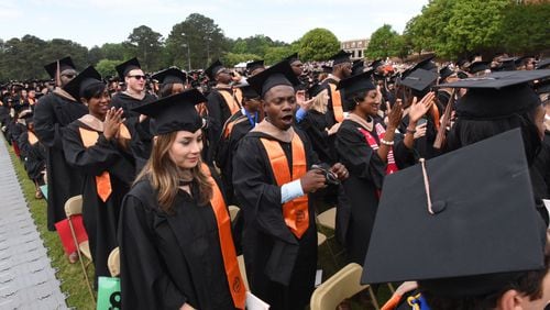 Mercer University students during commencement ceremonies. AJC FILE PHOTO