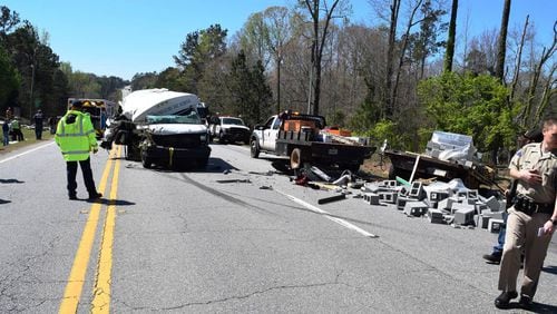 Augusta Preparatory Day School's golf coach, Chuck Mason, is in critical condition after a bus carrying him and the team hit a flatbed truck Thursday afternoon.