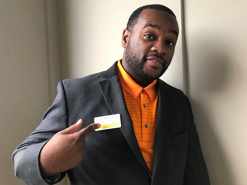 Ed Garnes, a doctoral student at the University of Tennessee-Knoxville, wears a “badge,” to safely navigate the campus. Garnes started wearing what he calls his “Freedom Badge,” after several instances where his presence on campus was questions.