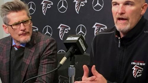 Falcons general manager Thomas Dimitroff, left and coach Dan Quinn speak Thursday, Jan. 18, 2018, in Flowery Branch, Ga. Quinn reviewed the 2017 season and said offensive coordinator Steve Sarkisian will return for the 2018 season. (AP Photo/Charles Odum)