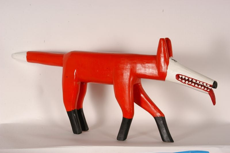 A Minnie Adkins carved fox, one of her favorite subjects. CONTRIBUTED BY SLOTIN FOLK ART