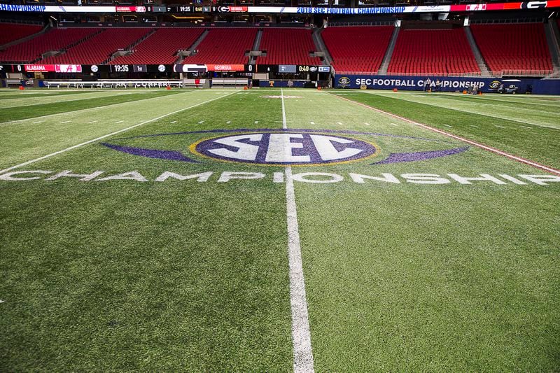 The SEC championship logo is displayed on the field of Mercedes-Benz Stadium on Nov. 30, 2018, the day before Georgia played Alabama in the 2018 SEC Championship game. (AJC photo by ALYSSA POINTER)
