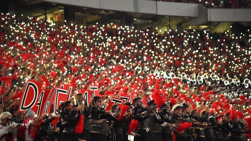 Fans light up the stadium during the second half  in a NCAA college football at Sanford Stadium in Athens on Saturday, September 21, 2019. Georgia defeated Notre Dame 23-17. (Hyosub Shin / Hyosub.Shin@ajc.com)