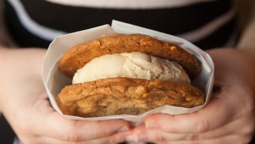 This beautiful ice cream sandwich at Butter & Cream in Decatur is made with two Brown Sugar Almond cookies and Salted Butterscotch ice cream (styling by Sally Williams and Henryk Kumar) (Photography by Renee Brock/Special)