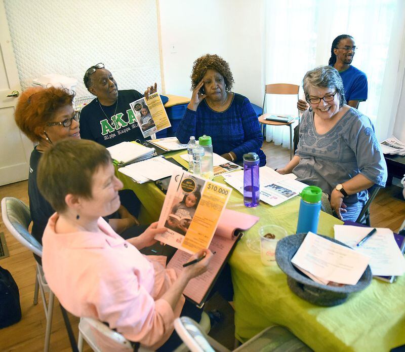 Members of the DeKalb Remembrance Committee meet in May to continue planning events that will culminate in the unveiling of lynching markers in Decatur and Lithonia next year. RYON HORNE / RHORNE@AJC.COM