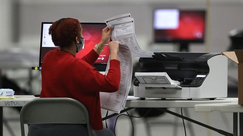 112420 STONECREST: DeKalb Voter Registration and Elections workers begin scanning ballots to electronically recount more than 373,000 votes by the state-mandated timeline on Tuesday, Nov 24, 2020, in Stonecrest.  “Curtis Compton / Curtis.Compton@ajc.com”