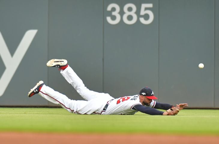 Photos: Braves seek Game 1 win over the Cardinals