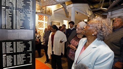 Ellie Dahmer, widow of Vernon Dahmer of Hattiesburg, who was killed in 1966 by the Ku Klux Klan, view some of the artifacts in the Mississippi Civil Rights Museum during a special preview last month. (AP Photo/Rogelio V. Solis)