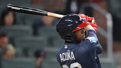 Ronald Acuna singles in the Braves Future Stars exhibition game - that sweet swing will make its Major League debut soon enough. (Curtis Compton/ccompton@ajc.com)