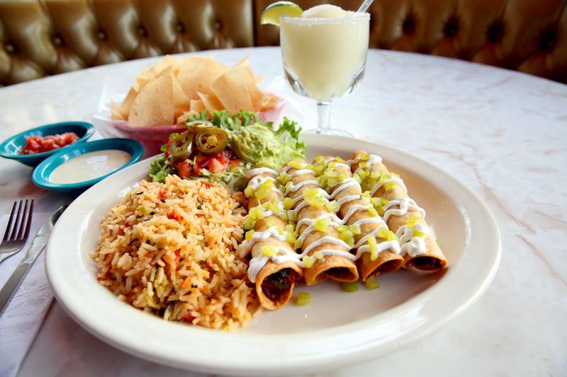 Green Chile Chicken Flautas are among the new dishes created for the 30th Annual Chuy’s Green Chile Festival. CONTRIBUTED BY: Chuy s Tex-Mex