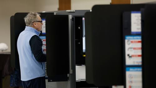 Decatur resident Tom Barry cast a ballot at Evergreen Baptist Church during the Georgia presidential primaries on Tuesday.