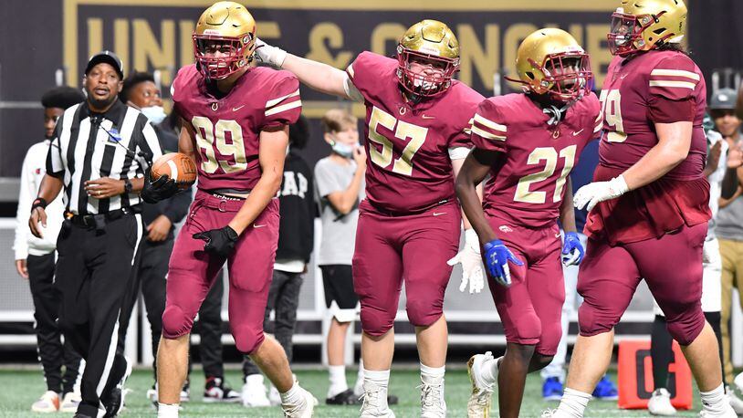 August 21, 2021 Atlanta - Brookwood's Stone Bonner (89) celebrates with teammates after he scored a touchdown during the 2021 Corky Kell Classic on Saturday, August 21, 2021. (Hyosub Shin / Hyosub.Shin@ajc.com)