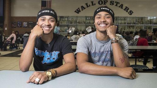 Senior students Darion (left) and DeAndre (right) Nelson pose for a portrait at South Gwinnett High School in Snellville, Monday, August 13, 2018. In June 2018, the twin brothers were awarded $2,500 at the inaugural Youth Entrepreneurs Summit Big Idea National Competition. This competition took place in Wichita, Kansas. The brothers, who are both DJ’s, own the event-promotion company Youngest Doin It. (ALYSSA POINTER/ALYSSA.POINTER@AJC.COM)