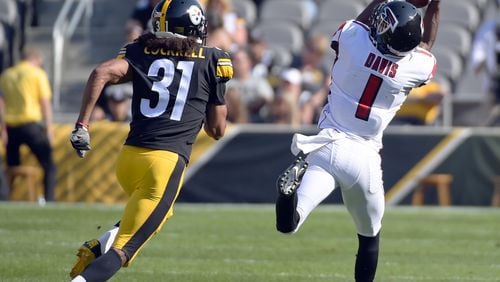Atlanta Falcons wide receiver Reggie Davis (1) hauls in a pass after getting by Pittsburgh Steelers cornerback Ross Cockrell (31) in the first half of an NFL preseason football game, Sunday, Aug. 20, 2017, in Pittsburgh. (AP Photo/Fred Vuich)