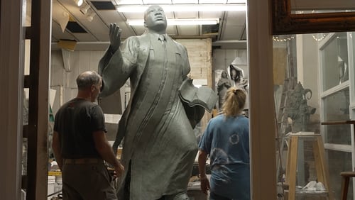 Sculptors Stan Mullins of Athens and Kathy Fincher of Duluth work on the new Martin Luther King, Jr. statue in Mullins' Athens studio. The statue, titled "I've Been to the Mountaintop," will will be installed at Rodney Cook Sr. Peace Park on Saturday. (World Peace Revival)