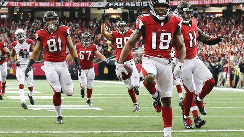 November 27, 2016, Atlanta: Falcons wide receiver Taylor Gabriel scores a 35-yard touchdown against the Cardinals for a 17-10 lead during the second quarter in an NFL football game on Sunday, Nov. 27, 2016, in Atlanta.   Curtis Compton/ccompton@ajc.com