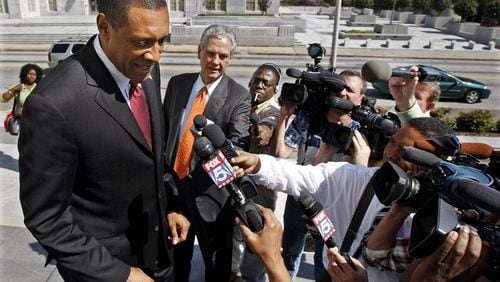 Former DeKalb County CEO Vernon Jones faced a battery of reporters in 2010 outside federal court after a verdict that his administration discriminated against senior white employees. Curtis Compton / ccompton@ajc.com